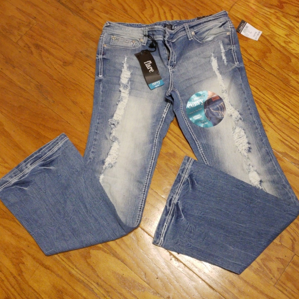 Juniors size 11 curvy distressed jeans.